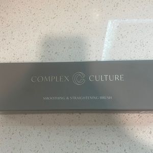 Smoothing and straightening heat brush